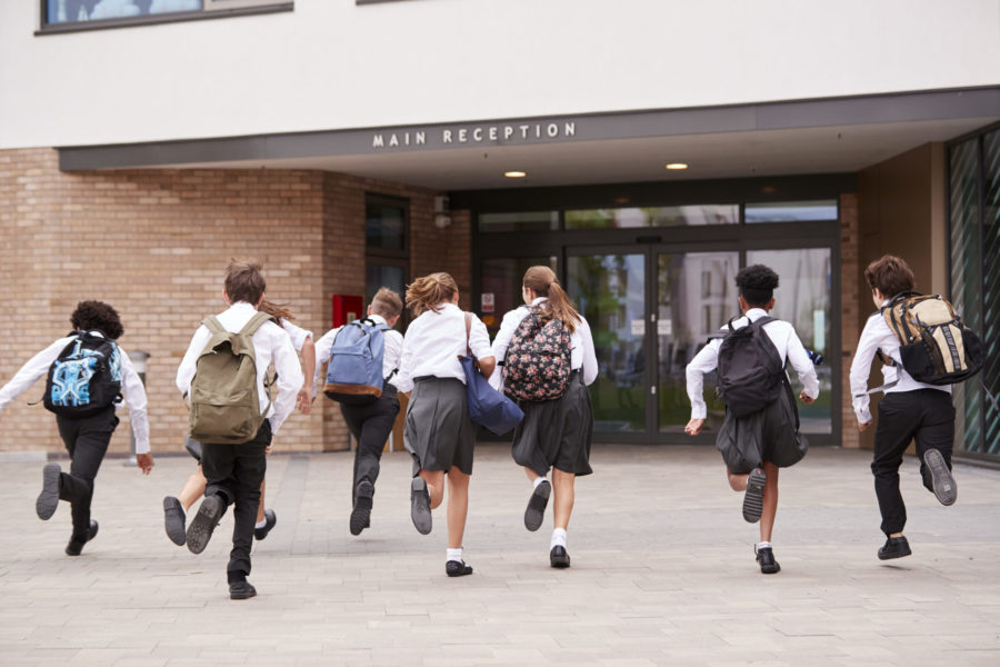 Private school students entering school that uses a payment system